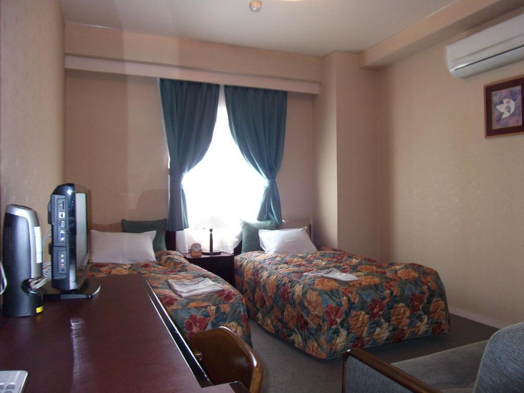 Asahi City Inn Hotel Такаока Стая снимка